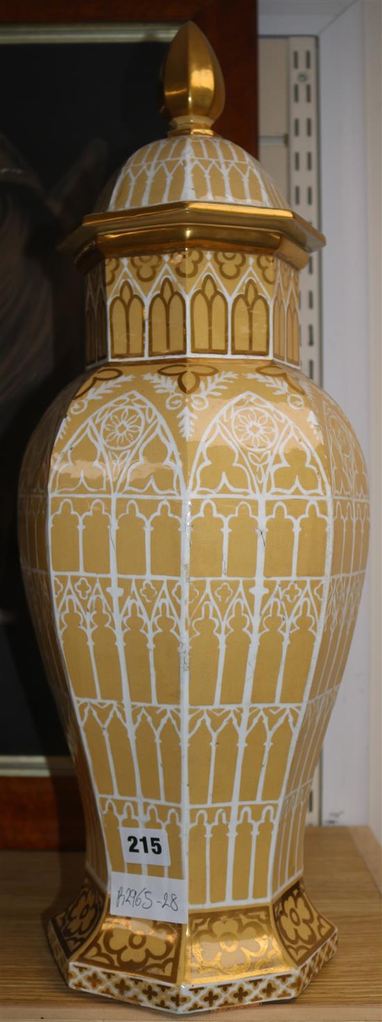 A Victorian gothic pottery vase and cover